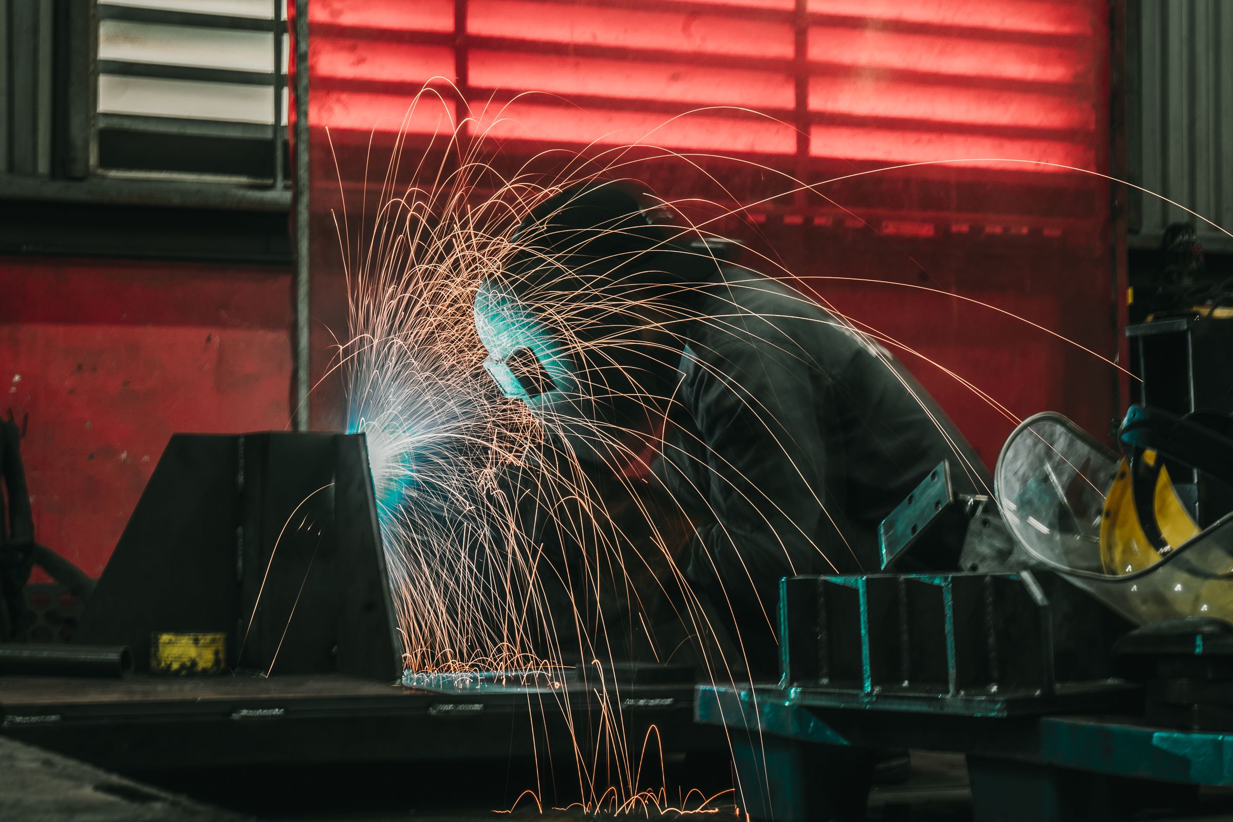 Welding structural steel in the workshop